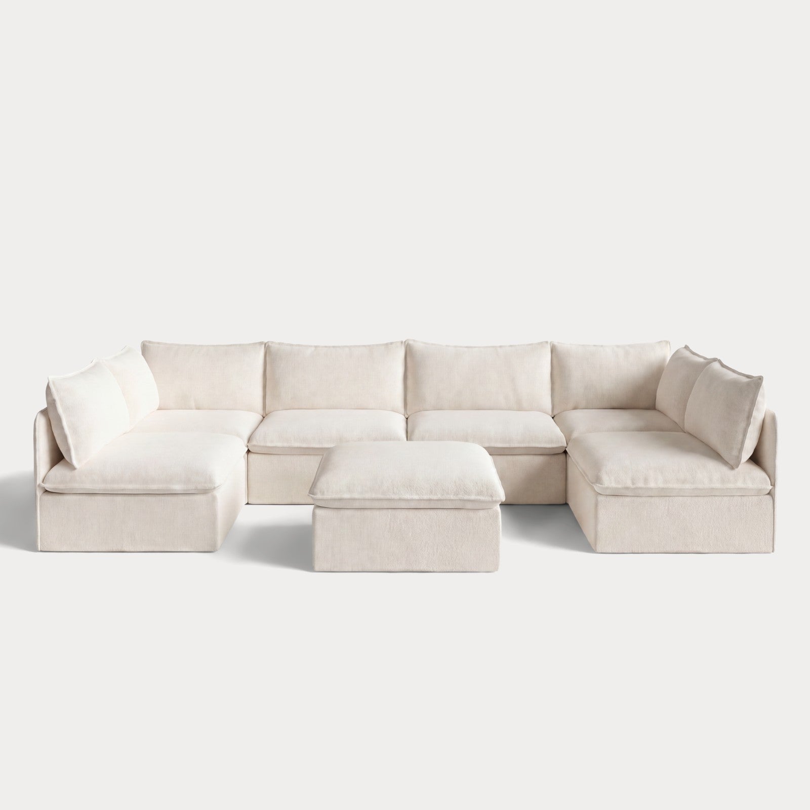ch_front-view_6-seater-open-ends-u-sectional-ottoman-creme